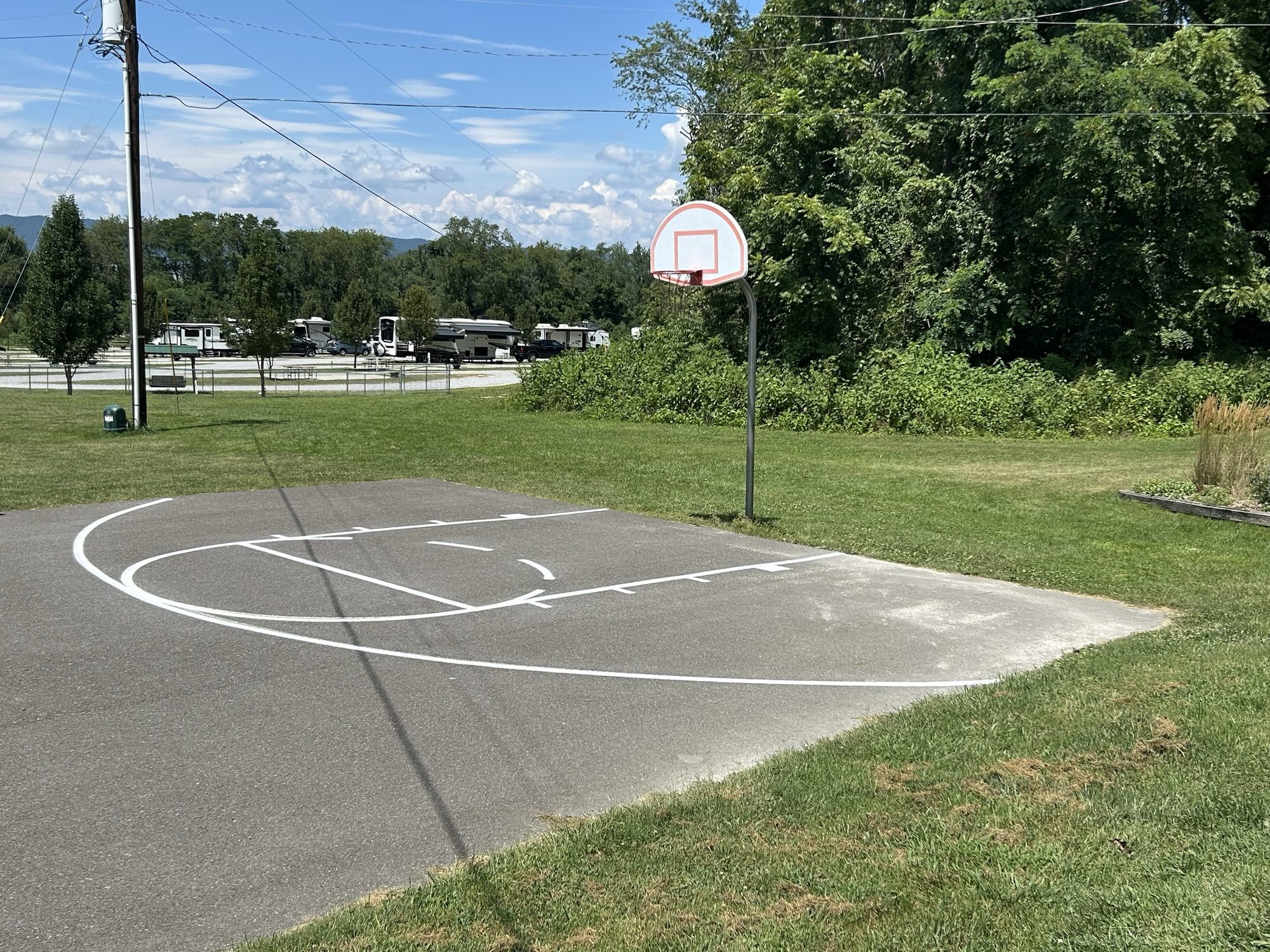 Freshly painted outdoor basketball court lines