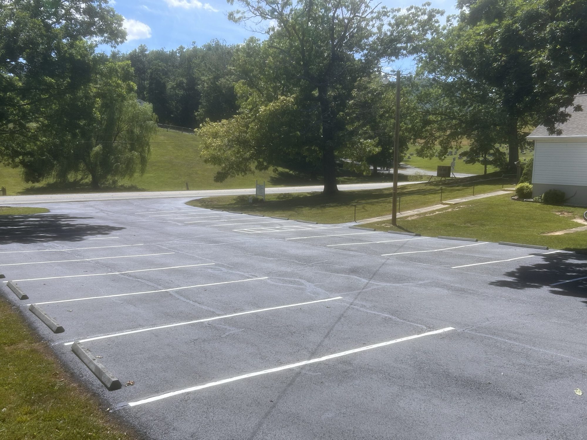 Parking lot with concrete wheel stops
